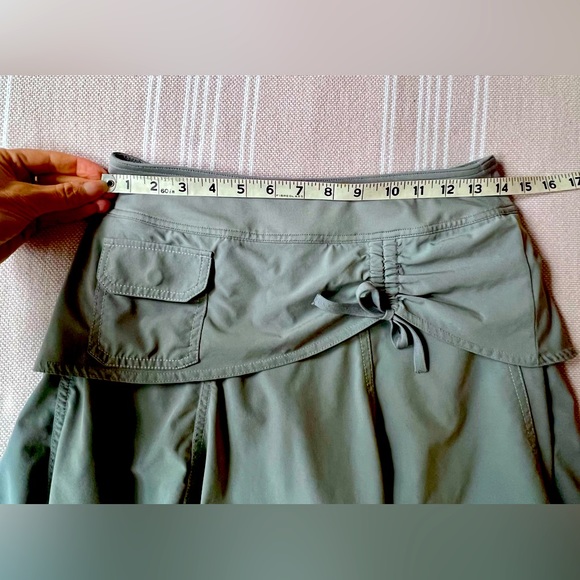 Athleta skort with small button front pocket and tie front bow. - Picture 6 of 6